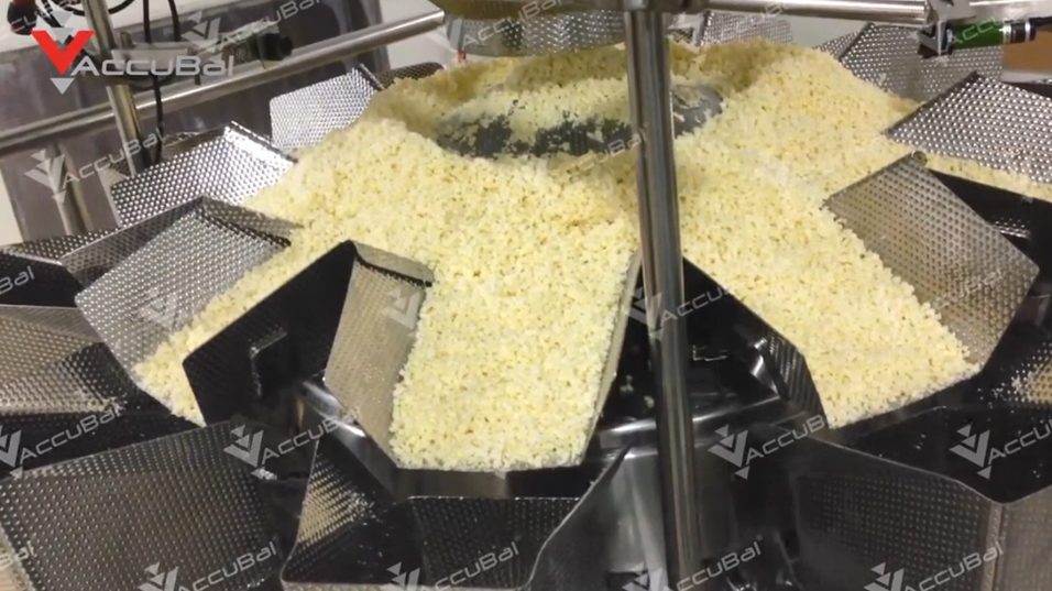 Accubal multihead weigher for cheese